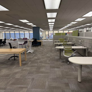 space with corner tables and chairs for coworking