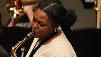 Photo of woman playing saxophone