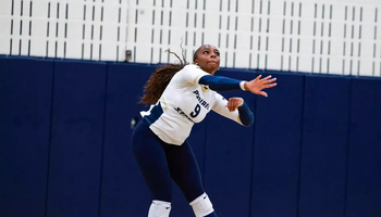 Erica Sledge serves