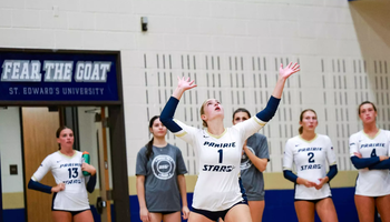 UIS volleyball player serves