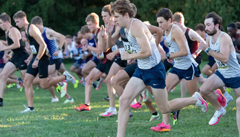 Men's Cross Country runners take off from the starting line