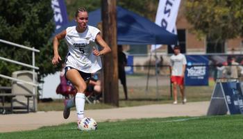Mallory Herber playing soccer