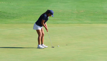 Erin Ahmadfadzir putting at UIS golf tournament