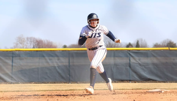 Ella Brinkley running the bases