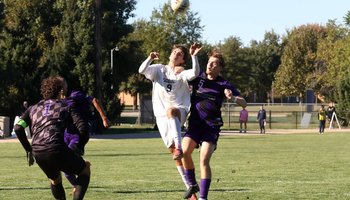 Robin Lemke Bergseth playing soccer in white UIS uniform