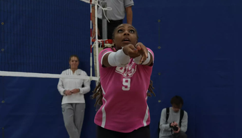 Erica Sledge playing volleyball