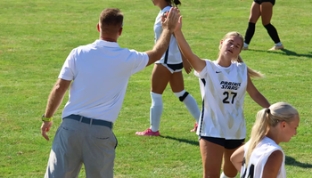 Abby Dellamorte giving Scott Myers a high-five