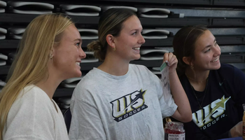 UIS women's soccer atheltes pose for photo during PBJ Springfield event