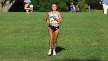 Madelyn Miller finishing cross country race