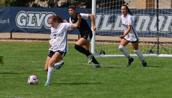 Kalli Drexler kicking soccer ball