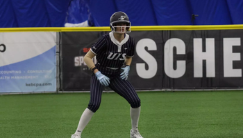 Rosie Bartletti playing softball