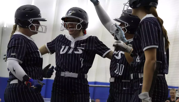 Softball celebrating a homerun