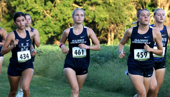 Lacey Updike and Allison Thompson running cross country