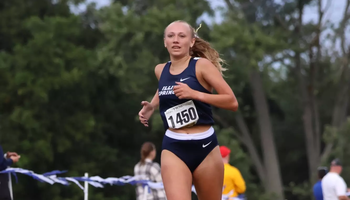 Olivia Thomsen running cross country