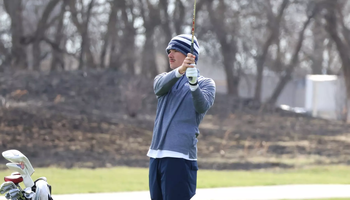 Jake Baldin golfing