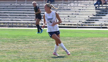 Mallory Herber playing soccer