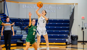 Kennedy Osterman playing basketball