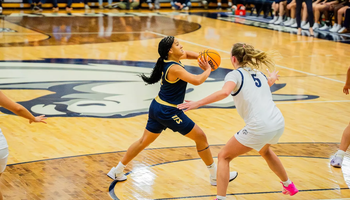 Kayla Rice playing basketball