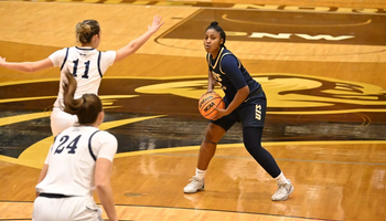 Tatianna McLaren playing basketball