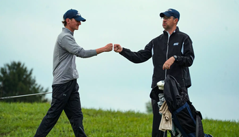 Brady Wilson and Coach Leotta fist bump