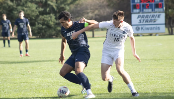 Lucas Harris battling for possession of the ball