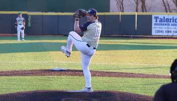 Isaac Graf  pitching in gold UIS uniform