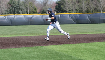 Mark Kattula running to third base