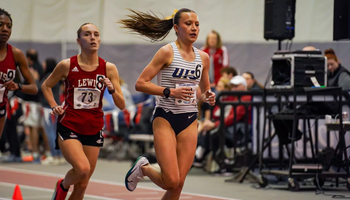 Maddie Miller racing indoor track