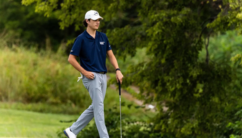 Jake Baldin walking on the green