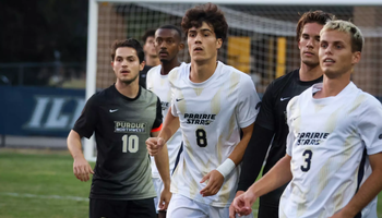 Jero Bencomo and PNW defenders in soccer game