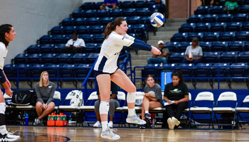 Makenna Cox passing a volleyball