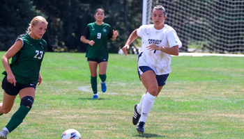 Taytum Scarborough playing soccer