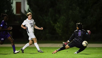 Joey Fitzgerald scores past the goalkeeper