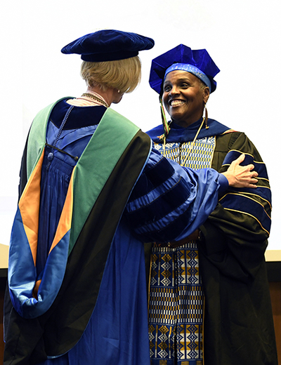 Hoff receives the Presidential Professor medallion.