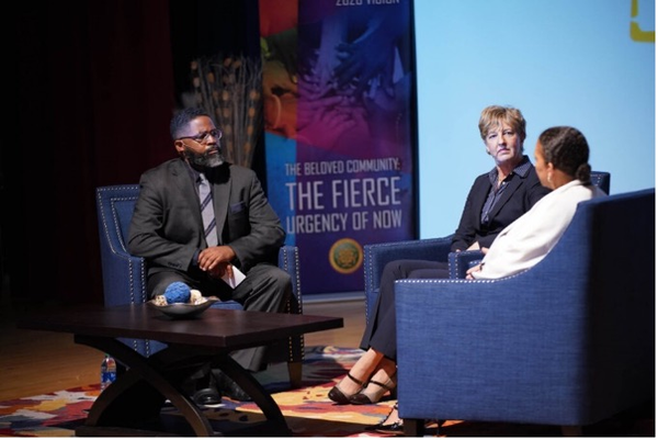 Presenter Dr. Jacqueline Battalora being interviewed on her new book by two colleagues. 