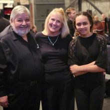 Three musicians taking a picture together