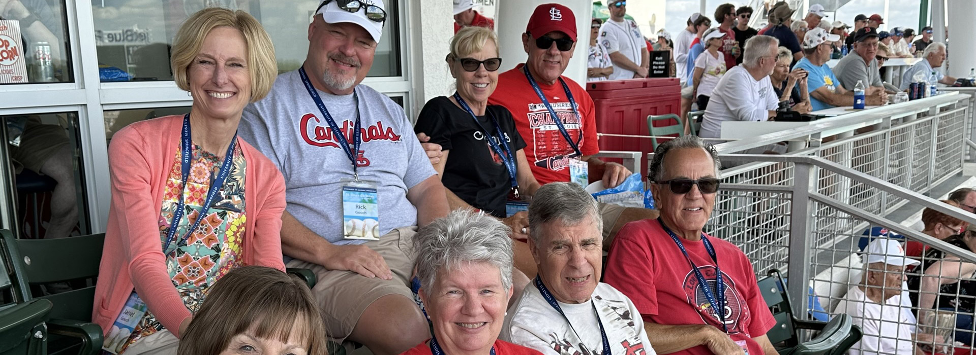 the chancellor and alumni at a St. Louis Cardinals game