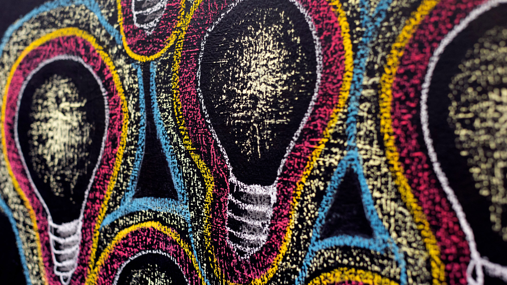 artwork of chalk lightbulbs at the Innovation Center