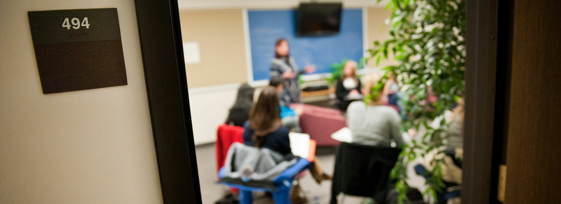 people in room speaking