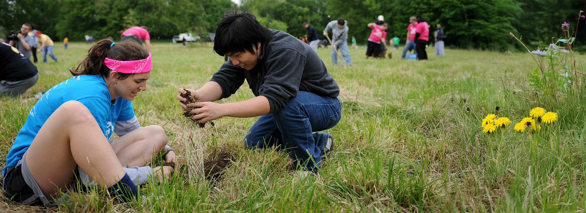 students planting trees