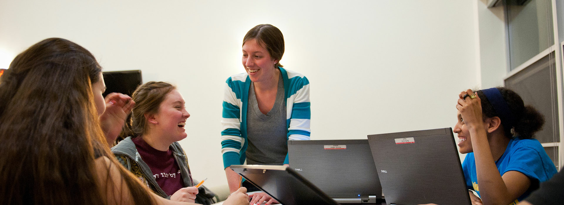 students and professor talking