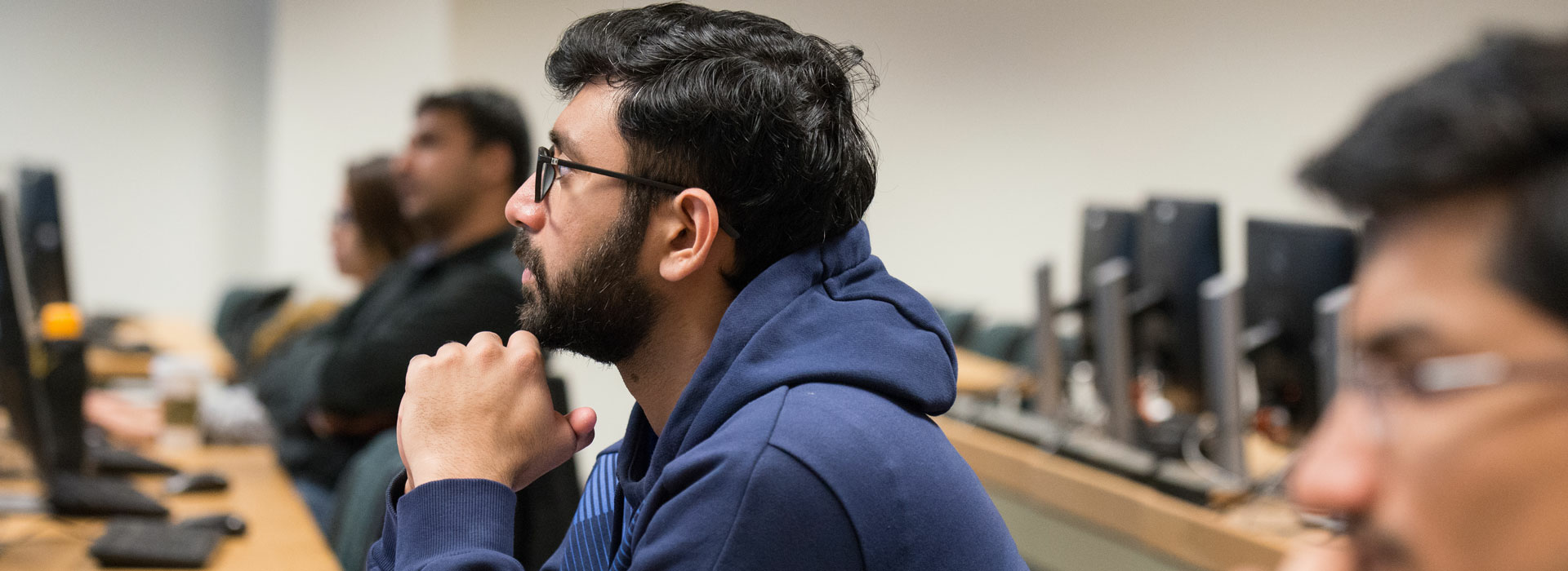 a MIS student paying attention in class