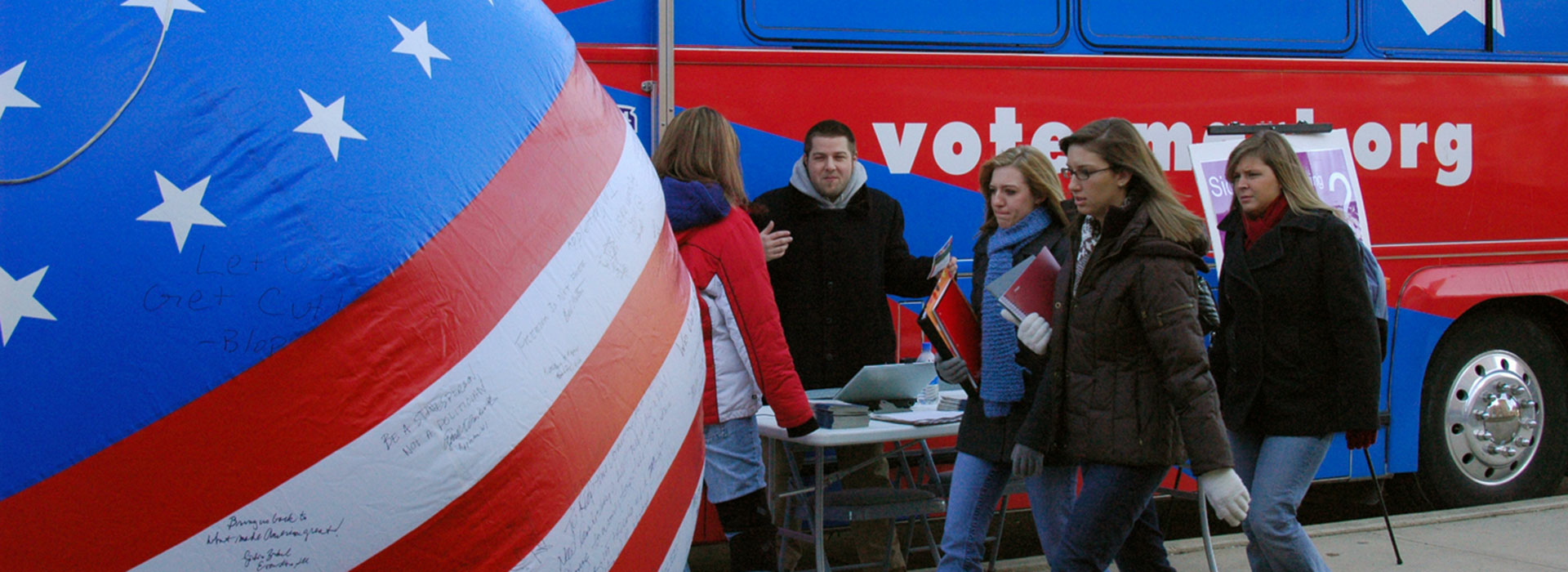 students in voting booth